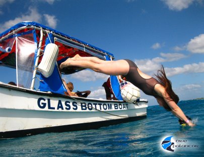 Dive Palancar-Un viaje de snorkel en un barco de fondo de cristal en Palancar