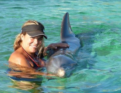 Nada  con delfines en Waterland - Waterland